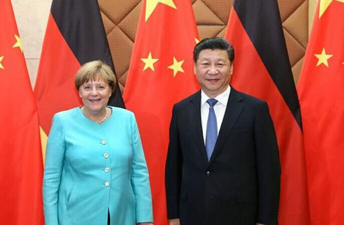6月13日，国家主席习近平在北京会见德国总理默克尔。
